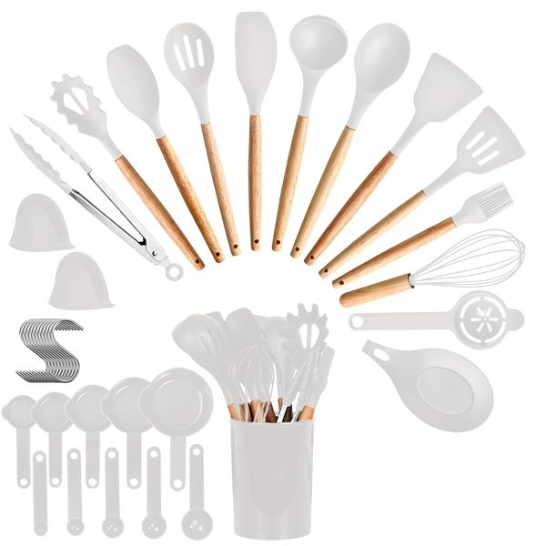 Thirty-five piece wood-handle kitchen utensil set standing in a holder