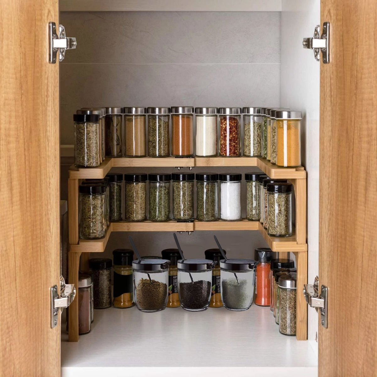 Bamboo two-tier expandable spice rack in a kitchen cabinet (spices and jars not included)